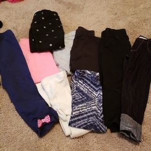 9 pair of assorted toddler leggings and tights